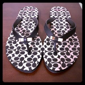 Coach flip flops with gold bow detail